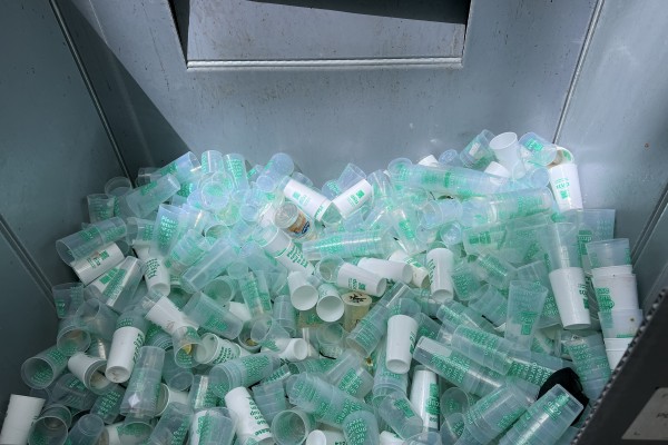 A pile of Reuse cups that have been used in a music venue